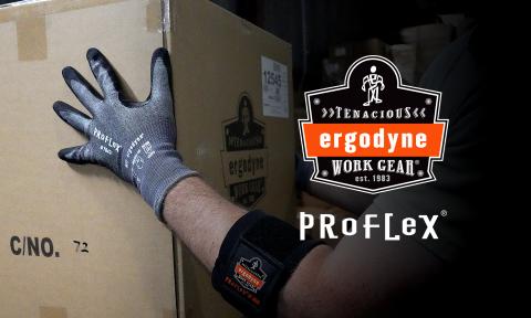Worker wearing ProFlex work gloves while carrying a cardboard box