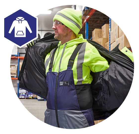 Person putting jacket on over their mid layers