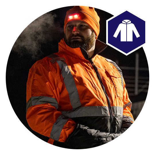 Person outside on a cold night in hi-vis thermal gera