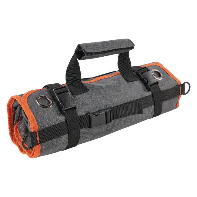3-quarter rolled view of roll up tool bag with zippered pockets