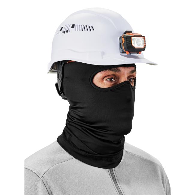 3q view of a model wearing a black spandex balaclava face mask underneath a hard hat