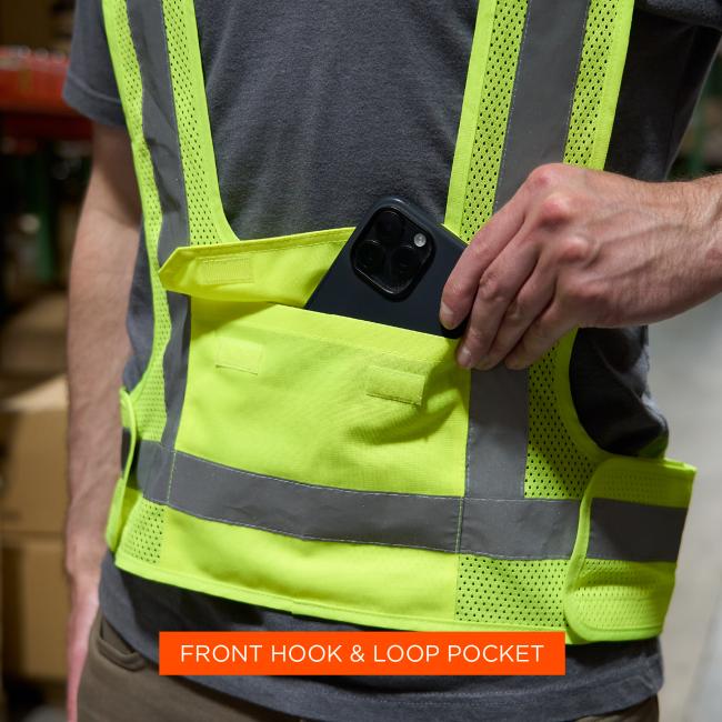 A front hook and loop pocket provides convenient storage for essentials like a phone or small tools, keeping them secure and easily accessible during work.