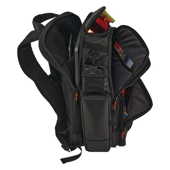 Profile view of mobile office backpack with all compartments propped and open