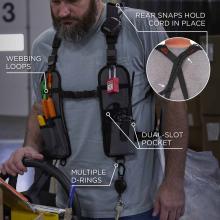 Features include webbing loops, rear snaps that hold the cord in place, a dual-slot pocket, and multiple D-rings for versatile attachment and storage options