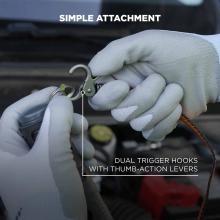 Simple Attachment: Dual trigger hooks with thumb-action levers for easy use