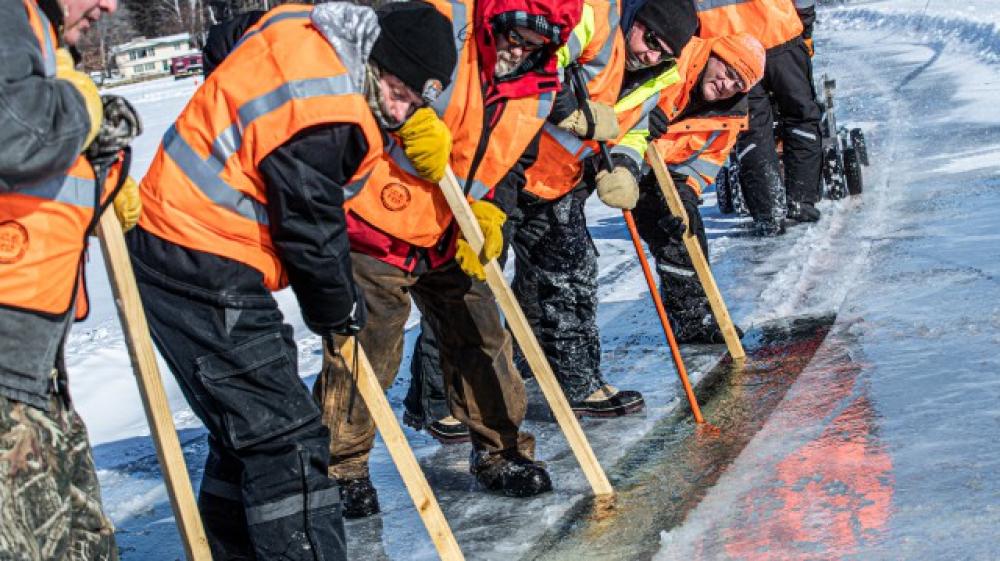 People building ice carousel