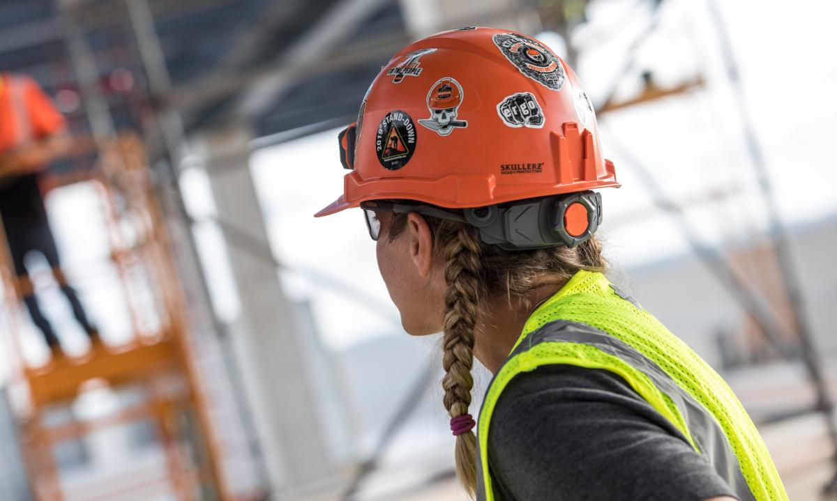 Worker wearing orange hard hat