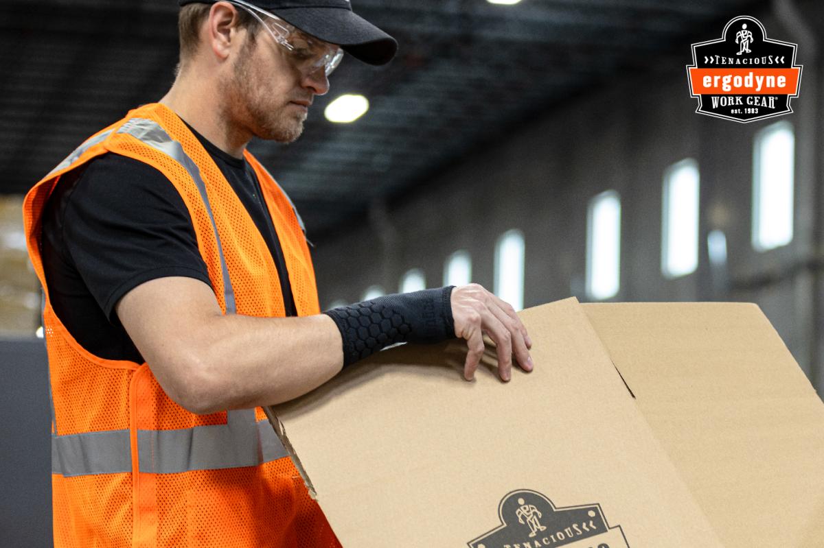 Worker wearing Ergodyne ProFlex wrist support and safety vest